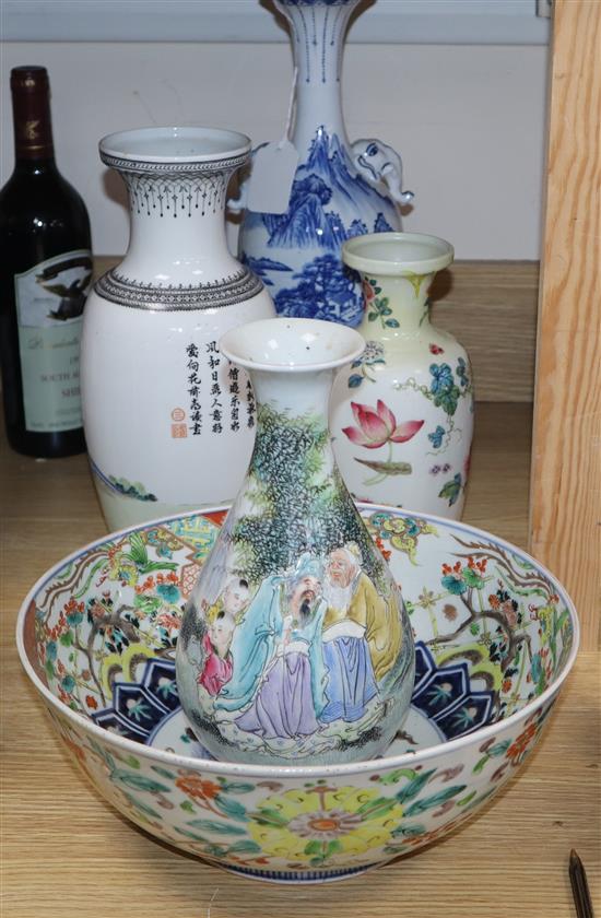 A collection of Asian ceramics, including a punch bowl and four vases, various